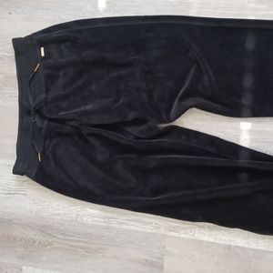 Velour track pants  Calvin Klein Size M Black with gold detail  Like new